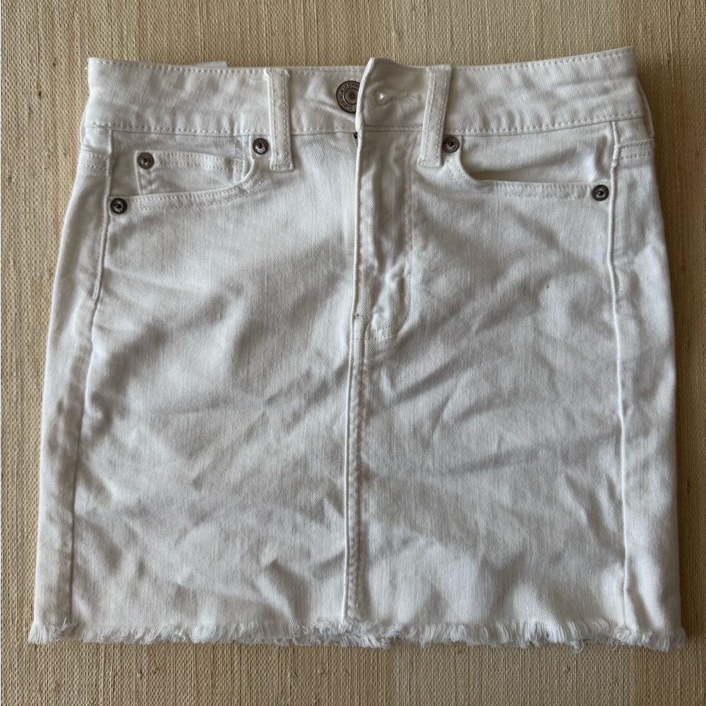 Flattering white denim mini skirt - great condition!